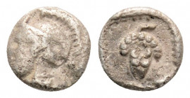 Greek
CILICIA, Soloi (circa 410-375 BC)
Hemiobol Silver (5.9mm 0.26g)
Helmeted head of Athena left / Grape bunch within linear circle. 
BMC 24 var.