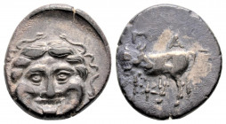 Greek
MYSIA, Parion. (circa 4th century BC.)
Hemidrachm Silver (14.8mm 2.17g)
Gorgoneion / ΠA–PI, bull standing left, head right; six-pointed star bel...