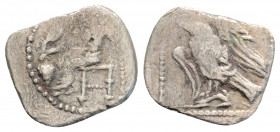 Greek
Cilicia, uncertain mint (circa 4th )
Obol Silver (12.5 mm 0.53g)
Baaltars seated left, holding grain ear, grape-bunch and sceptre / Eagle standi...