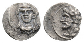 Greek
Cilicia, uncertain mint (Circa 4th century BC).
Tetartemorion Silver (7.6mm 0.22g)
Veiled and draped bust of female facing slightly to left, wea...