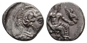 Greek
CILICIA. Uncertain. (circa 4th century BC).
Obol Silver (9.9mm 0.75g)
Helmeted head of Athena right. / Baaltars seated right on throne, holding ...