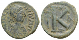 Byzantine 
Justin I (518 - 527 AD). Constantinople Mint,
Half AE Follis (17.9mm 2.19g)
Obv: D N IVSTINVS PP AV, Diademed, draped and cuirassed bust of...