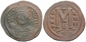 Byzantine 
JUSTINIAN I, (527-565 AD),Constantinople mint, issued year 14 = 549-541
AE Follis (41.5mm 21.05g)
Obv: Justinian bust facing, DN IVSTINI AN...