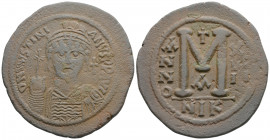 Byzantine
Justinian I. Justinian I; (527-565 AD). Nicomedia, Year 14 = 540/1 AD, 
AE Follis (42.5mm 21.92g)
Obv: D N IVSTINI - ANVS PP AVC Helmeted an...