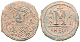 Byzantine
Maurice Tiberius (582-602 AD). Theoupolis (Antioch)
AE Follis (30.2mm 11. 61g)
Obv: DN MaYP-AYT, emperor wearing consular robes, mappa and e...