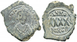 Byzantine
PHOCAS. Nicomedia mint. Struck (607-608 AD.)
AE Nummus (33.9mm 12.3g)
Obv: d m FOCA PER AVG, crowned bust facing, wearing consular robes, ho...