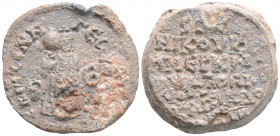 Byzantine Lead Seal (7 th century)
Obv: ΓЄωPΓIOV - ΠATPIKIOV; in field to left, two 'Indiction' symbols; in field to right, Justinian II standing faci...