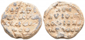 Byzantine Lead Seal (10 th century)
Obv: five lines of writing. Pearl border.
Rev: four lines of text. Pearl border.
(15.56 gr, 26.5 mm diameter)