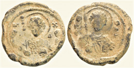 Byzantine Lead Seal (11 th century)
Obv: Nimbate facing bust of St. Michael, holding trefoil scepter in his right hand and globe in his left.
Rev: Nim...