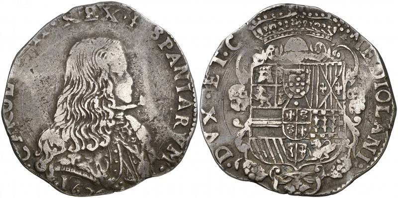 1676. Carlos II. Milán. 1 felipe. (Vti. 19) (MIR. 387/1). 26,65 g. MBC.