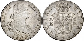 1802. Carlos IV. Madrid. FA. 8 reales. (Cal. 673). 26,52 g. Golpecito en canto. Escasa. MBC.