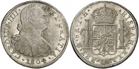 1804. Carlos IV. México. TH. 8 reales. (Cal. 701). 26,87 g. Leves marquitas. Parte de brillo original. MBC+/EBC-.