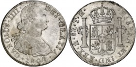 1807. Carlos IV. México. TH. 8 reales. (Cal. 707). 26,86 g. Mínimos defectos de acuñación. Bella. Brillo original. Escasa así. EBC+.