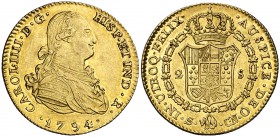 1794. Carlos IV. Sevilla. CN. 2 escudos. (Cal. 446). 6,71 g. Bella. Brillo original. Escasa así. EBC/EBC+.