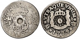 1734. Felipe V. México. MF. 1/2 real. 1,51 g. Columnario. Resello esfera rodeada de doce puntos. Ex Áureo 02/06/2004, nº 723. (BC).