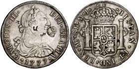 1777. Carlos III. Lima. MJ. 8 reales. 26,90 g. Resellos orientales pequeños y uno de Java (De Mey 768), falso. MBC.