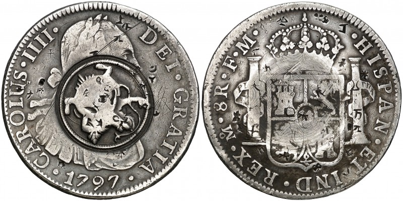 1797. Carlos IV. México. FM. 8 reales. 26,48 g. Varios pequeños resellos orienta...