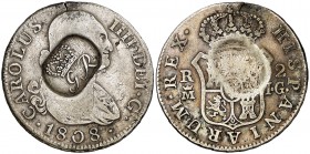 Belize-Honduras Británica. (De Mey 371). 5,70 g. Resello GR bajo corona, sobre un real de a 2 de Madrid 1808 IG. Mismo punzón que Kr. 2, aunque ese ca...