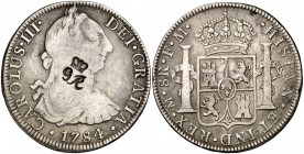 (1810-1818). Belize-Honduras Británica. (De Mey 372). 26,39 g. Resello falso: GR bajo corona. Sobre un real de a 8 de México 1784 FM. MBC-.