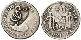 México. (De Mey 898) (Kr. 271.1). 1,54 g. Resello monograma del general José Francisco Osorno. Sobre 1/2 real de México 1804 TH. Escasa. MBC.