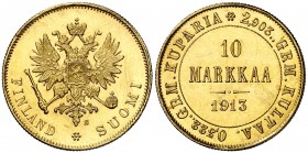 1913. Finlandia. Nicolás II. S. 10 marcos. (Fr. 3) (Kr. 9.2). 3,21 g. AU. Bella. S/C-.