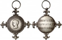 1888. Puerto Rico. Medalla de distinción Puerto Rico - Voluntarios. (Pérez Guerra 762). 19,54 g. 45 mm. Circular, con cuatro lises en los cardinales. ...