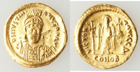 Justinian I the Great (AD 527-565). AV solidus (21mm, 4.24 gm, 6h). Choice VF, bent, marks. Constantinople, 4th officina, AD 527-538. D N IVSTINI-ANVS...