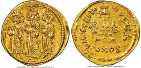 Heraclius (AD 610-641), with Heraclius Constantine and Heraclonas. AV solidus (21mm, 4.38 gm, 6h). NGC MS 4/5 - 4/5, die shift. Constantinople, 4th of...