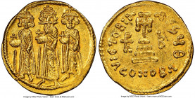 Heraclius (AD 610-641), with Heraclius Constantine and Heraclonas. AV solidus (20mm, 4.46 gm, 6h). NGC Choice AU 5/5 - 4/5. Constantinople, 9th offici...