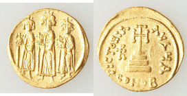 Heraclius (AD 610-641), with Heraclius Constantine and Heraclonas. AV solidus (20mm, 4.43 gm, 6h). XF. Constantinople, 1st officina, ca. AD 640-641. H...