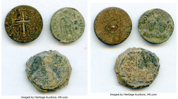 ANCIENT LOTS. Byzantine. Ca. AD 11th-12th centuries. Group of three (3) Pb items. VG-Fine. Includes: (3) Lead items of various issuers and motifs. Tot...