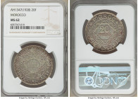 French Protectorate. Mohammed V 20 Francs AH 1347 (1928)-(a) MS62 NGC, Paris mint, KM-Y39. Two year type.

HID09801242017

© 2020 Heritage Auction...
