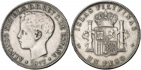 1897. Alfonso XIII. Manila. SGV. 1 peso. (Cal. 81). 24,82 g. Limpiada. Escasa. MBC-.