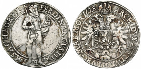 SAINT EMPIRE, Ferdinand II (1619-1637), AR Taler, 1628, Prague. D/ L''empereur deb. de f., en cuirasse, ten. un sceptre et le gl. cr. R/ Aigle impéria...