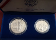 USA. Confezione composta da 2 monete.  Dollaro Ag. Mezzo Dollaro Cu-Ni. 1986.