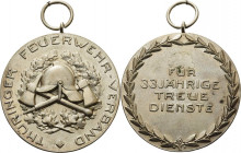 Feuerwehr
 Versilberte Bronzemedaille o.J. (1925/1934) Thüringer Feuerwehrverband. Feuerwehrehrenabzeichen 2. Modell. Für 33-jährige treue Dienste. 4...