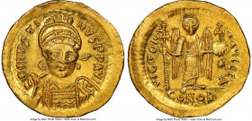 Justin I (AD 518-527). AV solidus (20mm, 4.43 gm, 6h). NGC MS 5/5 - 3/5, wavy flan. Constantinople, 5th officina. D N IVSTI-NVS PP AVG, helmeted, cuir...