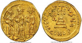 Heraclius (AD 610-641), with Heraclius Constantine and Heraclonas. AV solidus (20mm, 4.49 gm, 7h). NGC Choice AU 4/5 - 4/5. Constantinople, 5th offici...