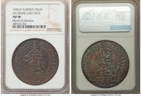 Salzburg. Johann Ernst Taler 1696/4 AU58 NGC, KM254, Dav-3510. Struck to the utmost precision, the surfaces toned to a glassy obsidian with emerald an...