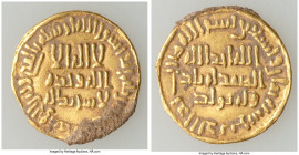 Umayyad. temp. Sulayman (AH 96-99 / AD 715-717) gold Dinar AH 98 (AD 716/717) VF (Residue), No mint (likely Damascus), A-130. 4.21gm. 21mm.

HID0980...