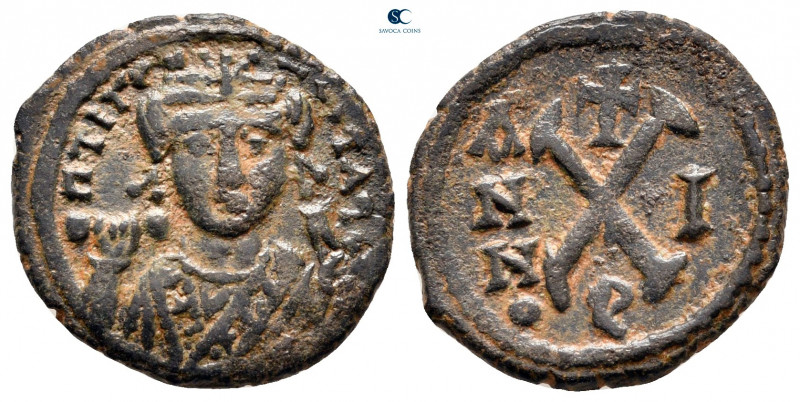 Tiberius II Constantine AD 578-582. Theoupolis (Antioch)
Decanummium Æ

19 mm...