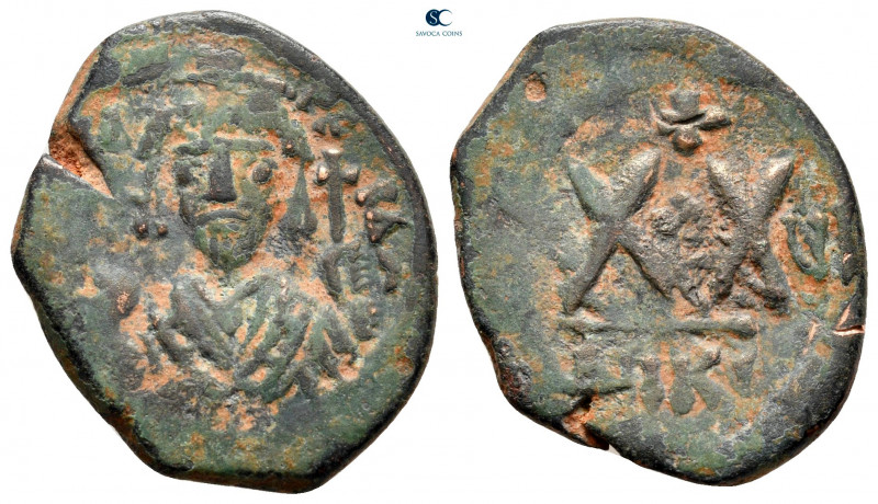 Phocas AD 602-610. Nikomedia
Half Follis or 20 Nummi Æ

24 mm, 5,16 g



...
