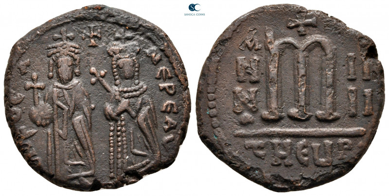 Phocas, with Leontia AD 602-610. Theoupolis (Antioch)
Follis or 40 Nummi Æ

2...