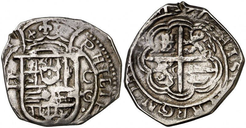 1597. Felipe II. Granada. C. 2 reales. (Cal. 471 var). 6,84 g. Tipo "OMNIVM". Or...