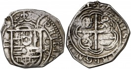 1597. Felipe II. Granada. C. 2 reales. (Cal. 471 var). 6,84 g. Tipo "OMNIVM". Orla interior en anverso y reverso. Rara. MBC.