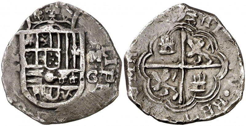 (15)98/7. Felipe II. Granada. M. 2 reales. (Cal. 475 var). 6,68 g. Tipo "OMNIVM"...