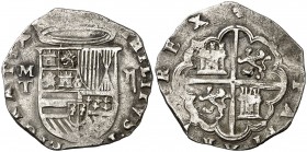 s/d. Felipe II. Toledo. M. 2 reales. (Cal. 555). 6,77 g. Águila en vez de león en las armas de Flandes. Rayita en reverso. Buen ejemplar. MBC.