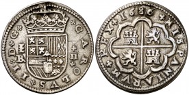 1686. Carlos II. Segovia. . 2 reales. (Cal. 648). 6,21 g. Escudo estrecho. Sirvió como joya. Rara. (MBC).