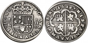 1686. Carlos II. Segovia. . 2 reales. (Cal. 648). 6,30 g. Escudo ancho. Rayitas por limpieza descuidada. Rara. (MBC).