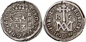 1700. Carlos II. Sevilla. M. 2 reales. (Cal. 654 var). 5,18 g. Tipo "María". Orla interior sólo en reverso. Valor: 2. Grieta, pero buen ejemplar. Prec...